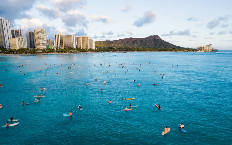 surfers in waikiki